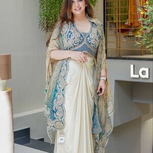 Elegant Blue and Cream Saree skirt with Embroidered Blouse and shrug